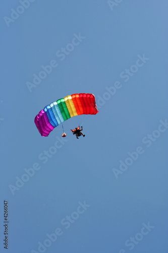 Parachuter with colored parachute