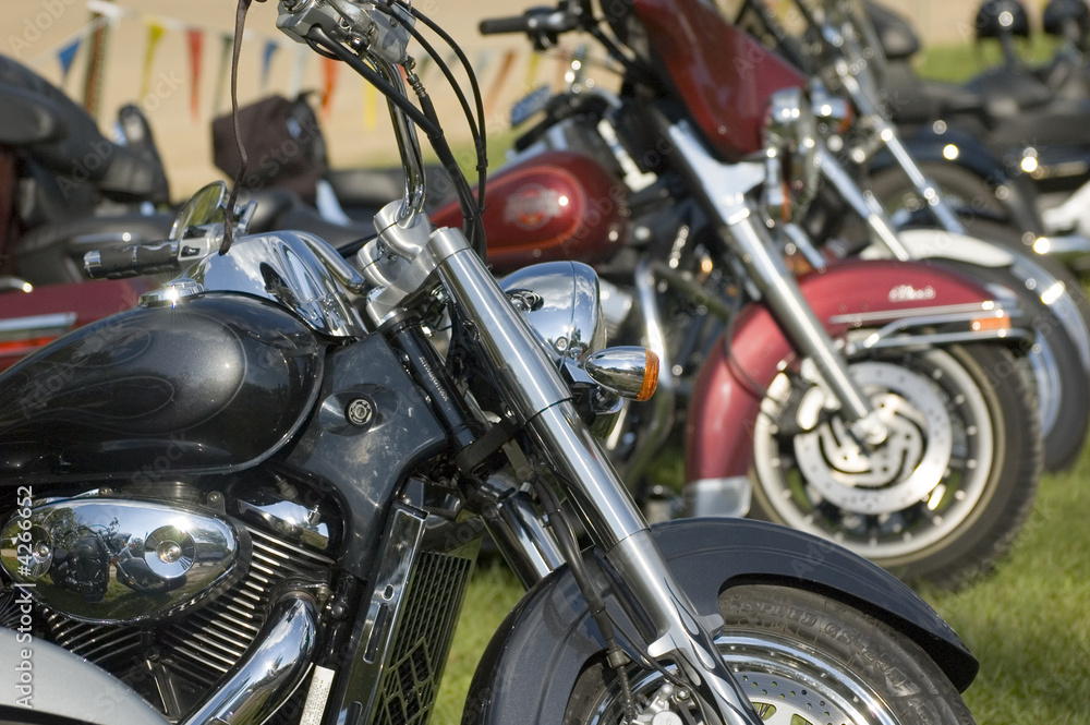 Row of parked motorcycles Row of parked motorcycles