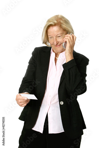 mature businesswoman talking on her cellphone 