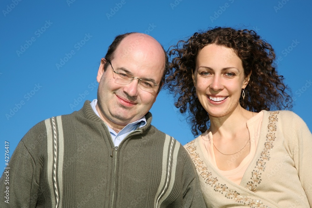 couple against blue sky