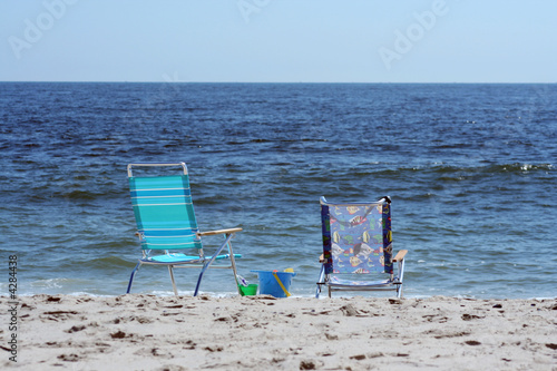 Fototapeta Naklejka Na Ścianę i Meble -  Beach Chairs near the ocean