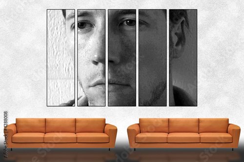 Orange sofas and large panel painting