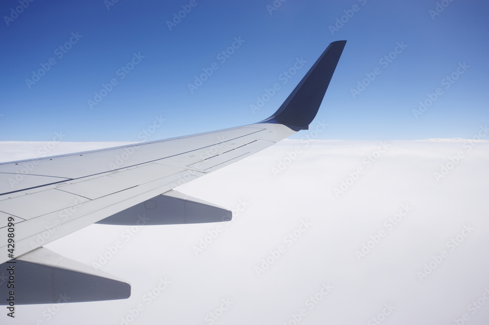 Fototapeta premium airfoil above clouds