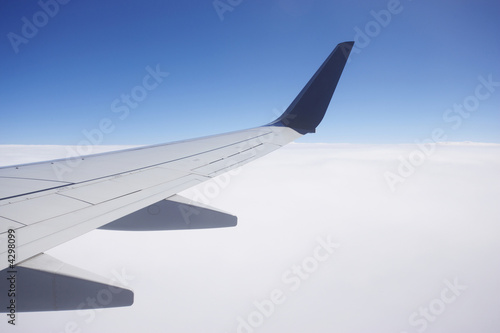airfoil above clouds photo