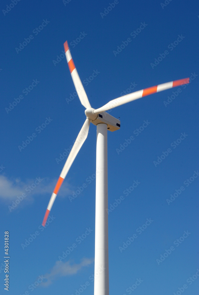 wind mill power generator against blue sky wind mill power generator against blue sky