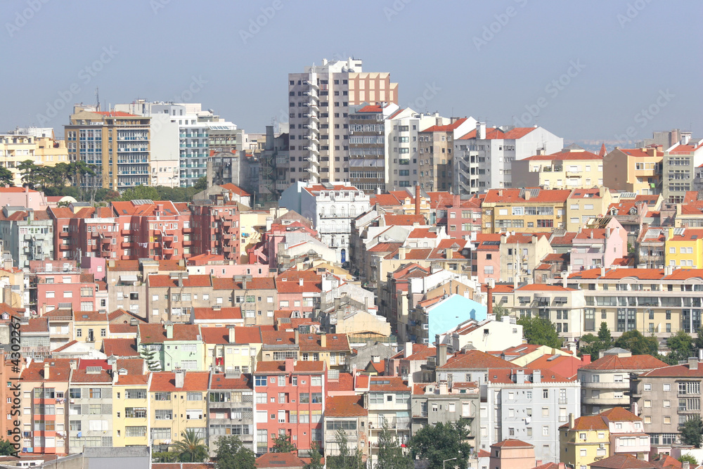 city landscape with several buildings and houses