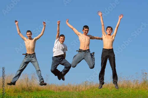 happy boys jumping