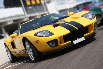 Wandcirkels Auto Supercar op het raceparcours  © Christopher Dodge