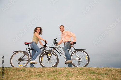 couple on bicycle walk
