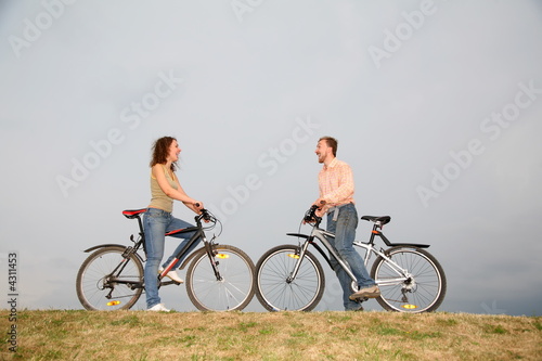 couple with bicycles