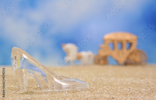 Glass Slipper on Beach With Carriage in Background, Shallow DOF