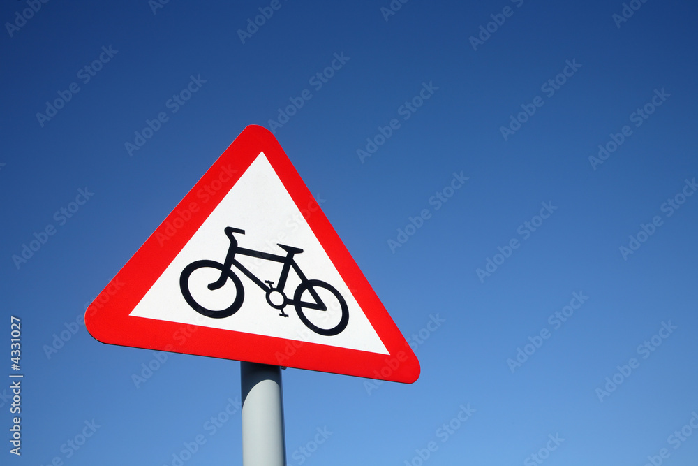 British cycle route ahead warning sign and a big blue sky. British cycle route ahead warning sign and a big blue sky.