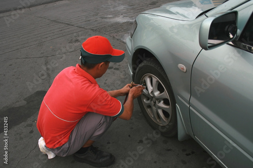 station crew providing free tire air checkup