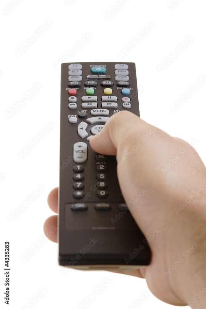 Person with a remote control in his hand Person with a remote control in his hand
