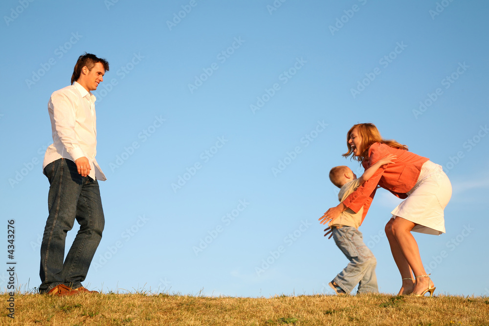 parents with the child in the meadow parents with the child in the meadow