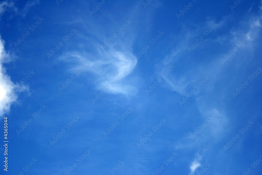 Obraz premium White clouds in the blue sky.