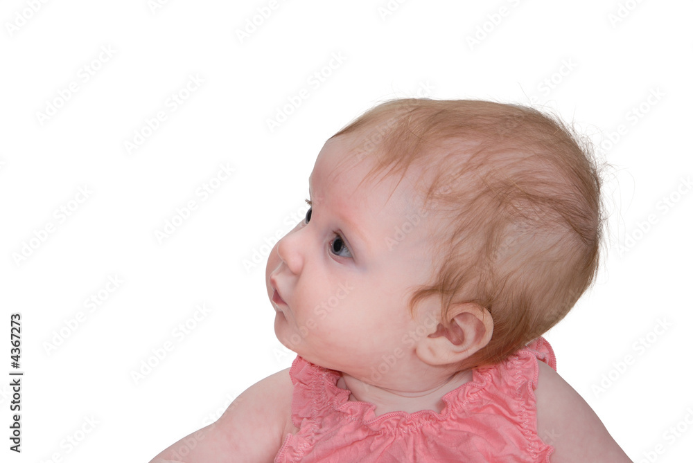 Baby looking to side at blank space for your copy Baby looking to side at blank space for your copy