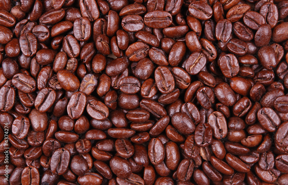 Obraz premium bunch of coffee beans close up / macro