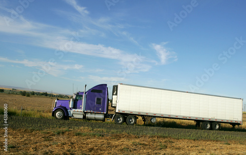 Semi truck going fast on interstate highway