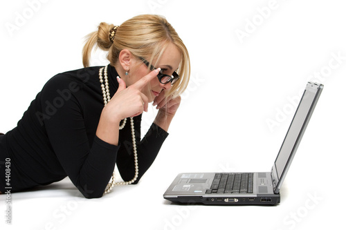 The beautiful blonde with laptops.