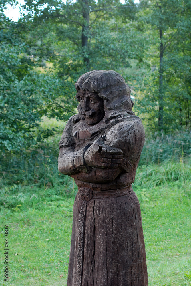 wooden man statue