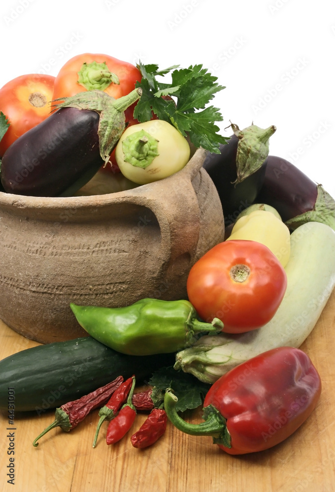 set of fresh vegetables with old clay pot set of fresh vegetables with old clay pot