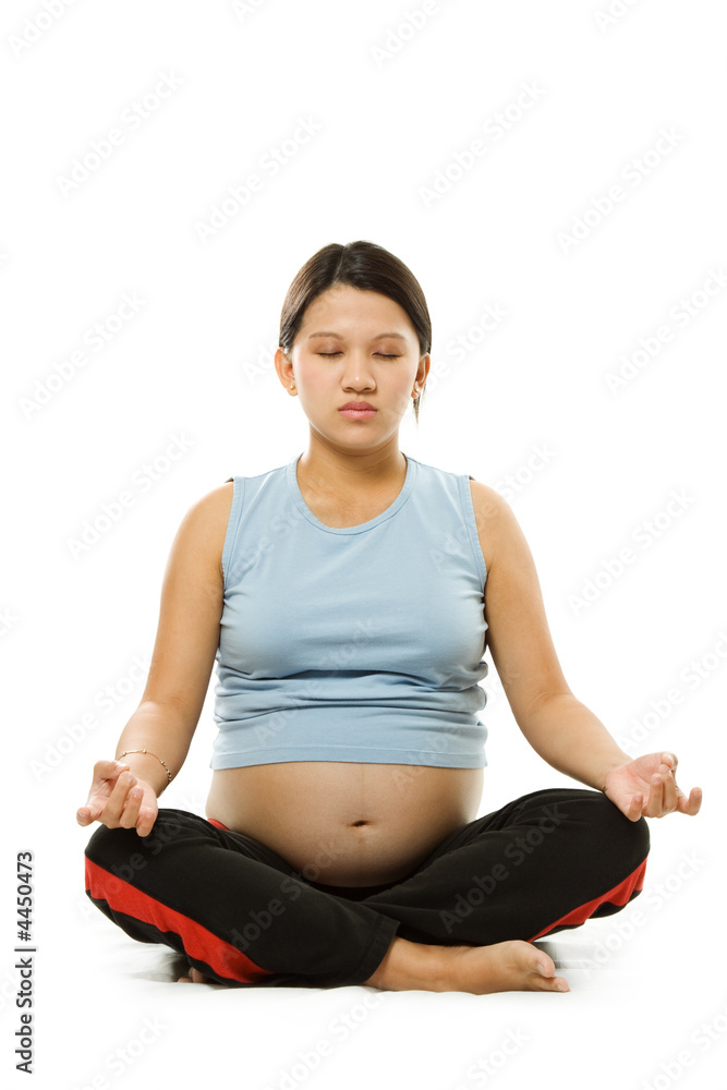 Pregnant woman meditating Pregnant woman meditating
