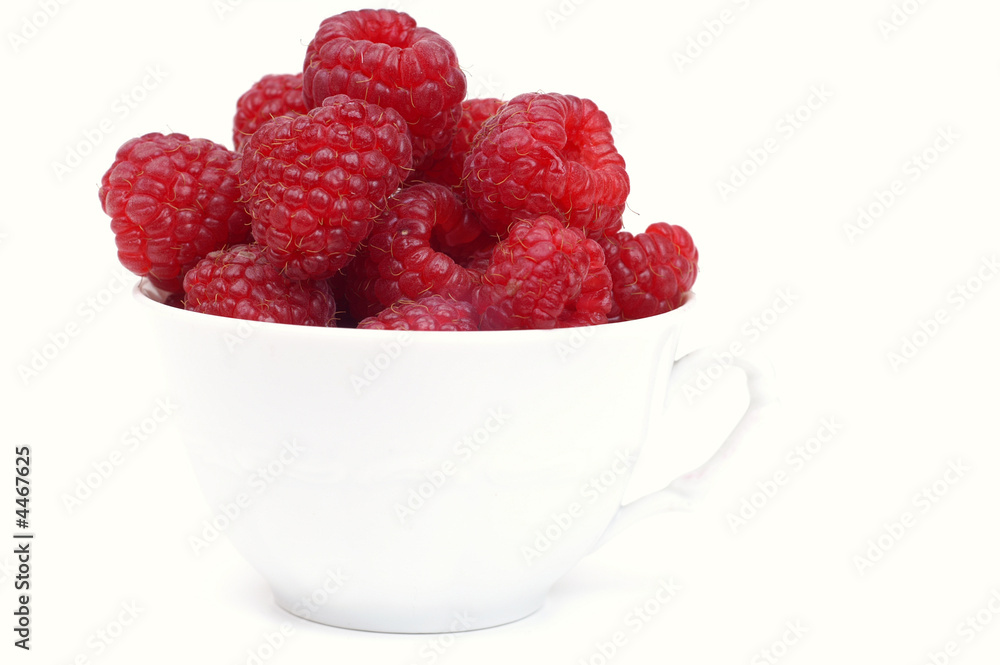 Raspberry on glass  cup