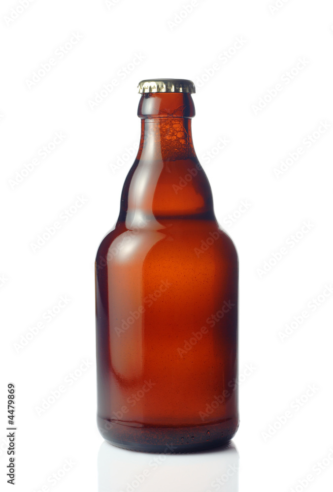 Beer bottle against white background