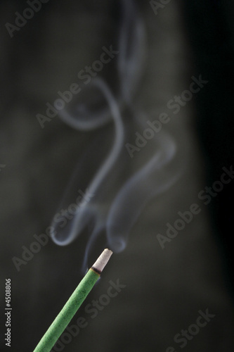 Joss sticks and white smoke
