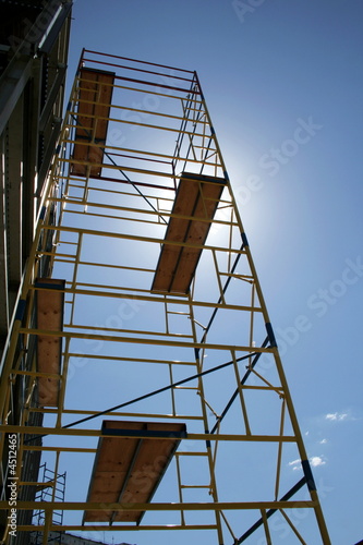 Scaffolding on blue sky background