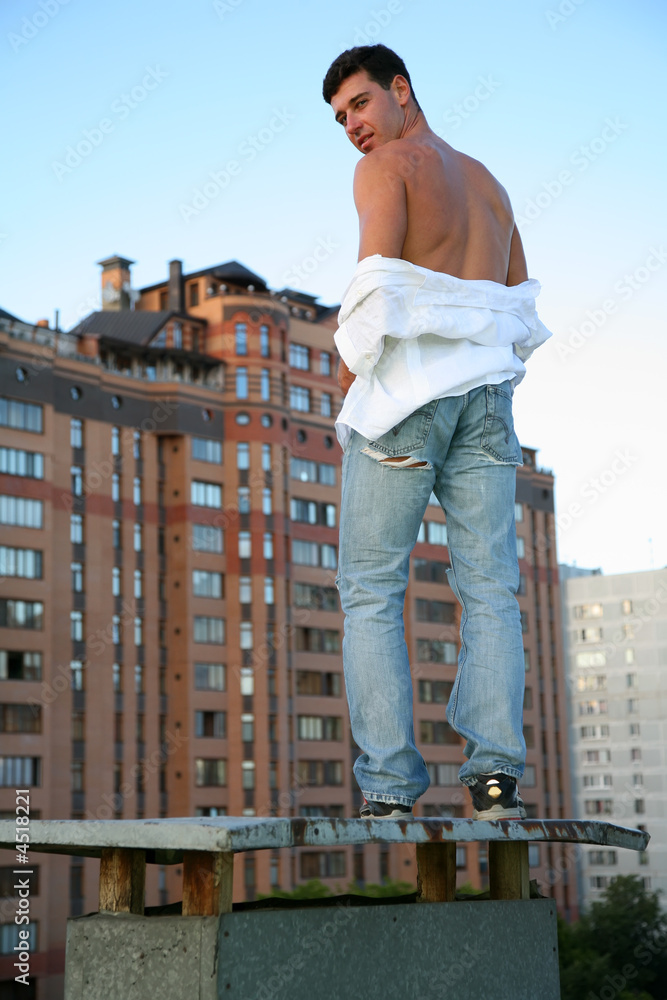 man against urban landscape man against urban landscape