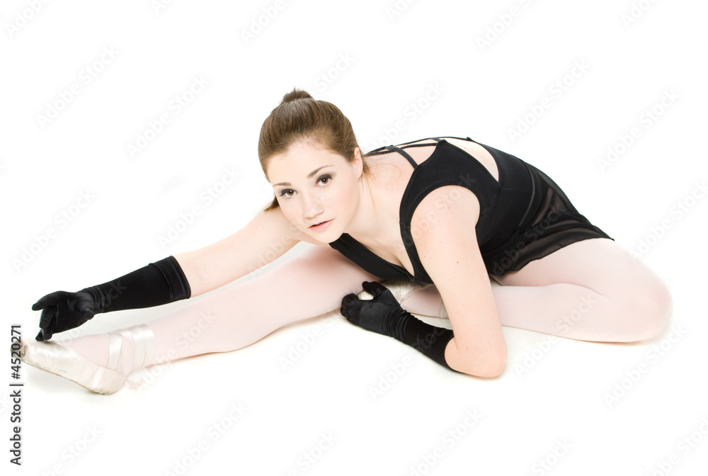 Fototapeta premium A young girl stretching