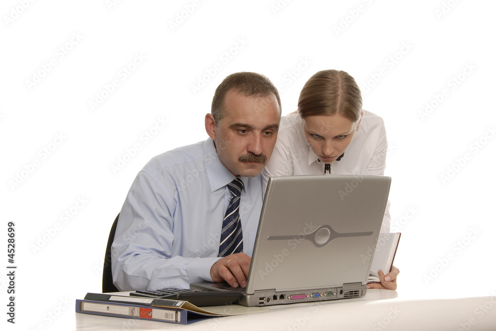 boss and secretary in front of the computer