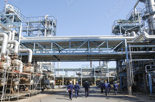 industrial workers finishing work