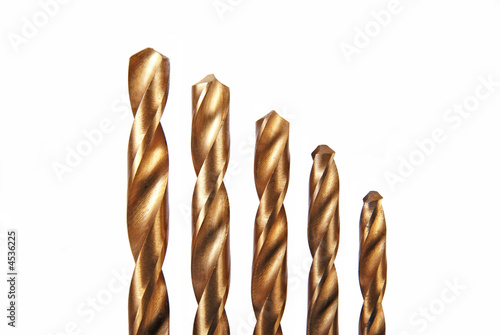 Five titanium coated drill bits – isolated on white
