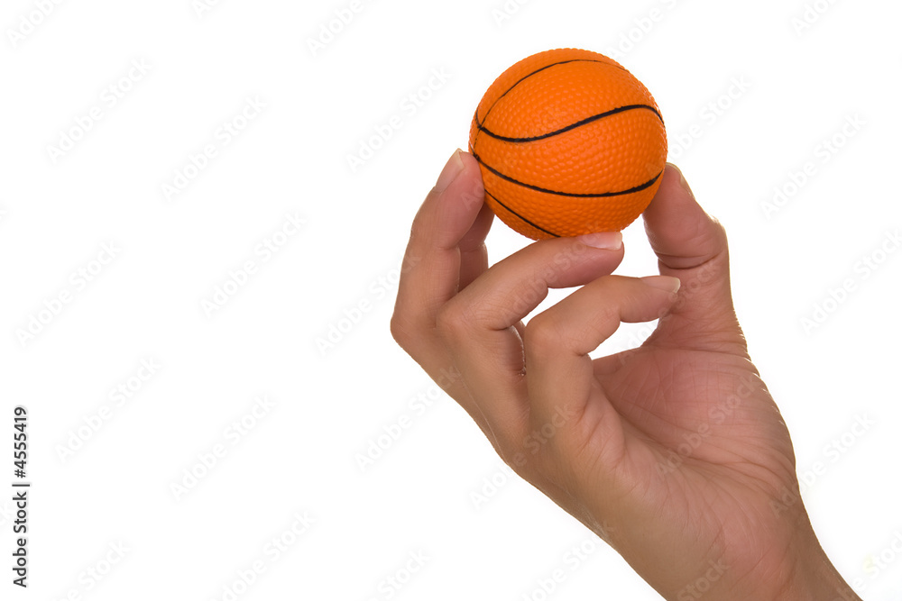 Hand holding basketball