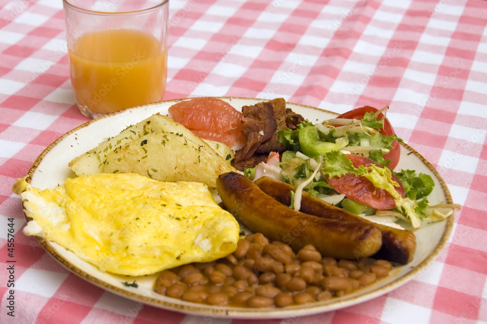 healthy breakfast of eggs, bacon, sausages and juice healthy breakfast of eggs, bacon, sausages and juice
