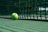 Tennis ball near net