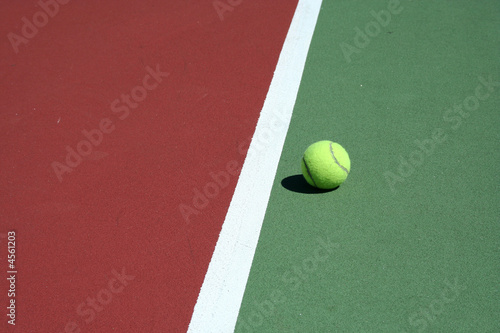 Tennis ball near net © Jim Mills