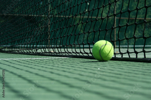 Tennis ball near net © Jim Mills