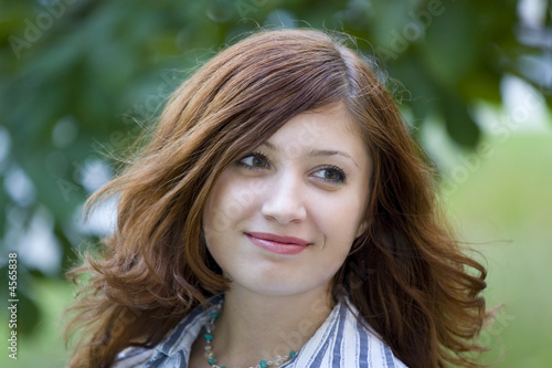 Beauty brunette in a park #1