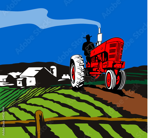 Tractor plowing the farm