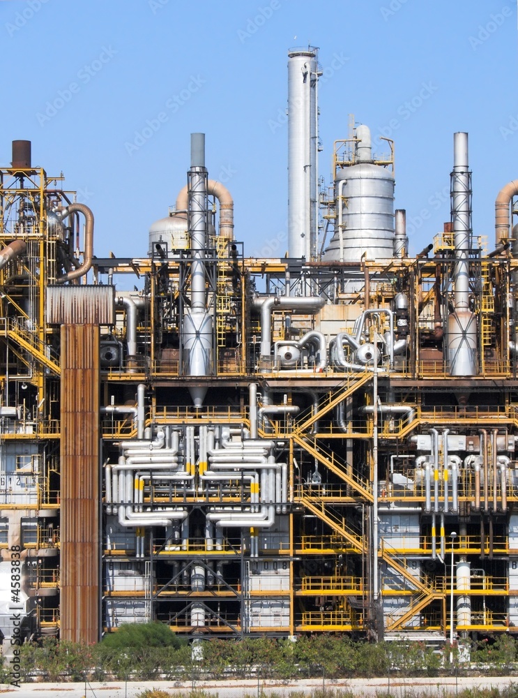 Towers of a refinery of chemistry industry Towers of a refinery of chemistry industry
