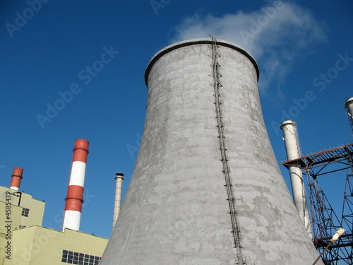 thermal power plant with several chimneys photo