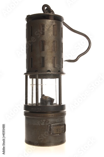 Old, rusty lantern isolated on white