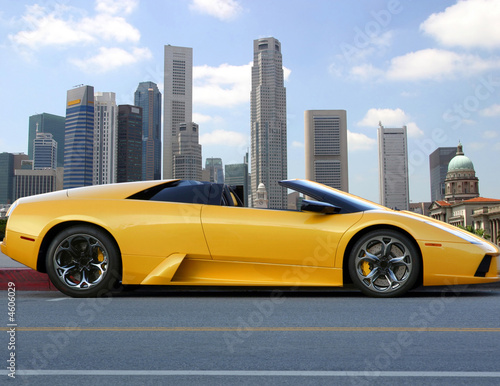 Yellow modern car on the roads of Singapore