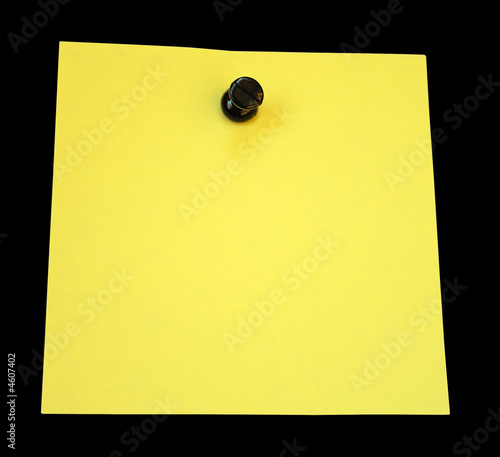 yellow note with tack