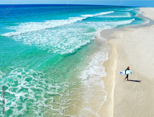 Lone Surfer on Beautiful Deserted Beach Fototapeta