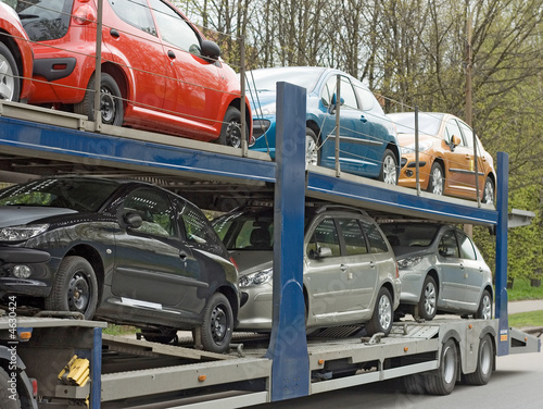  car carrier truck deliver new auto batch to dealer
